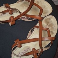 Worn strappy sandals