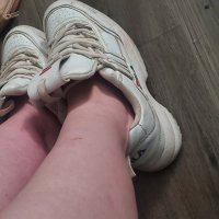 Strippers well worn fila sneaker…